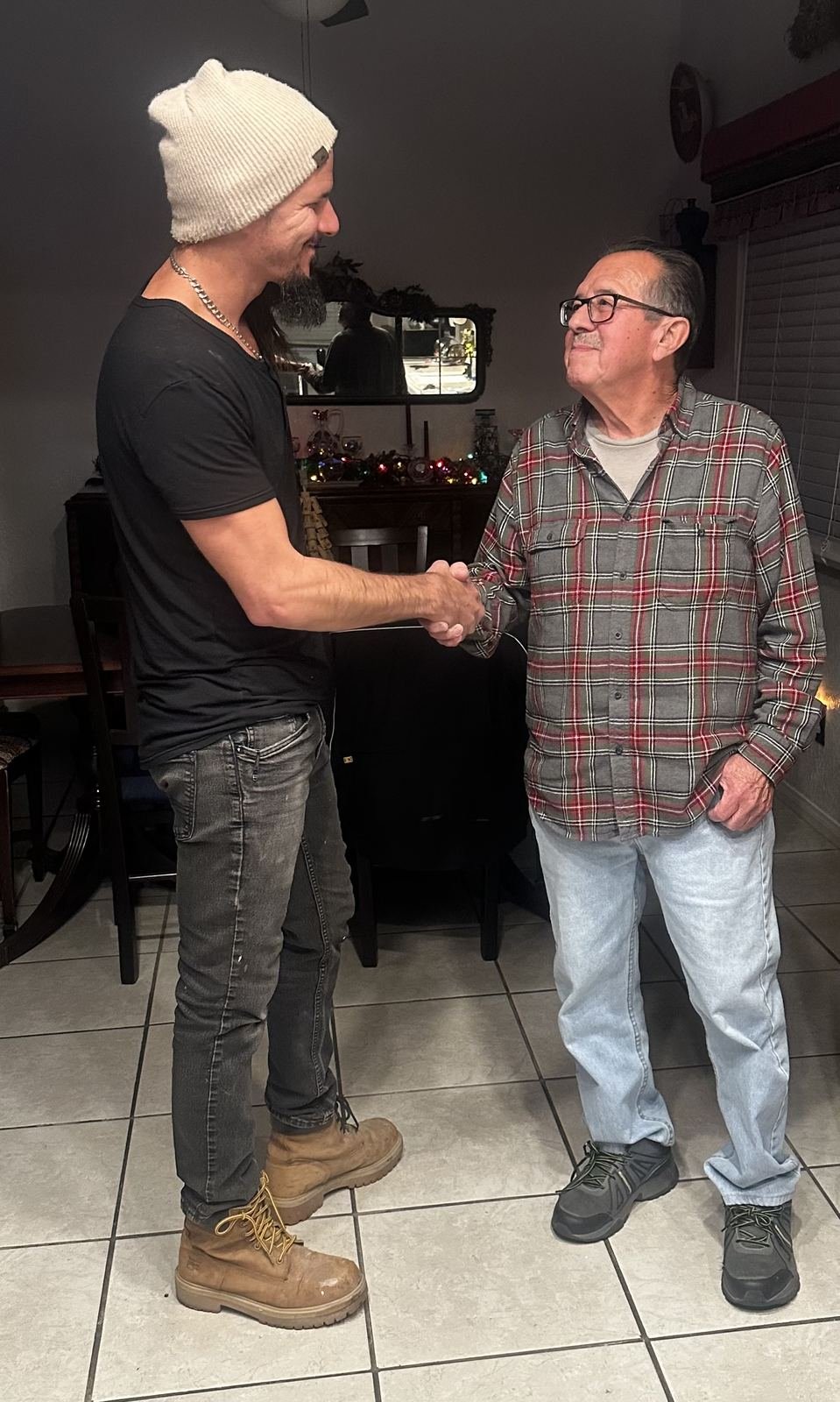 Rob shaking hands with a client