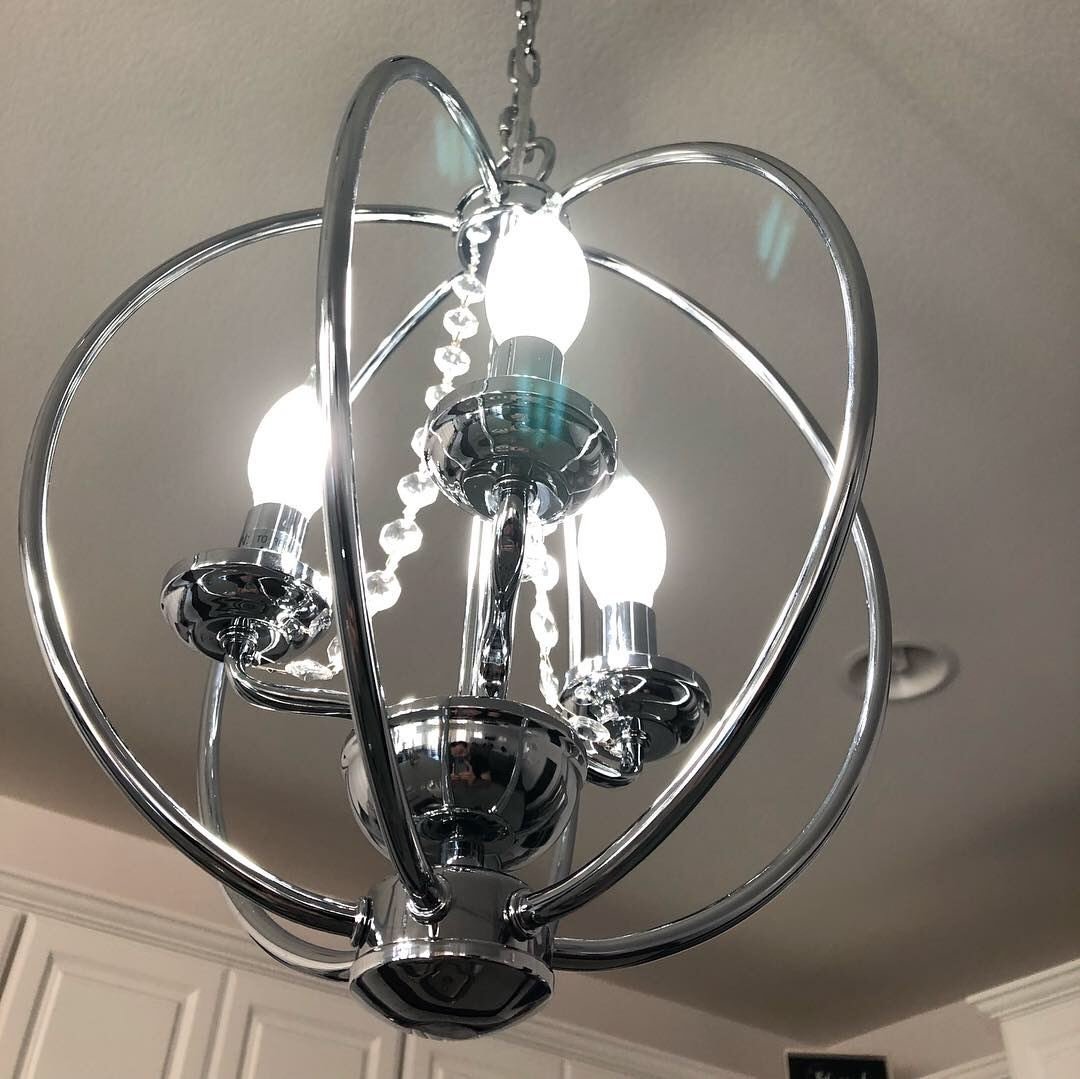 Custom chrome orb pendant lighting close-up detail