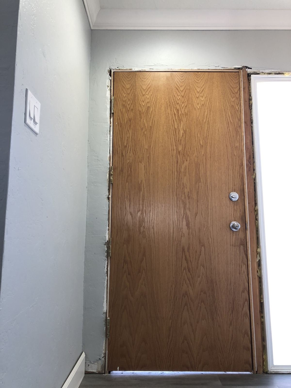 Old oak front door before replacement
